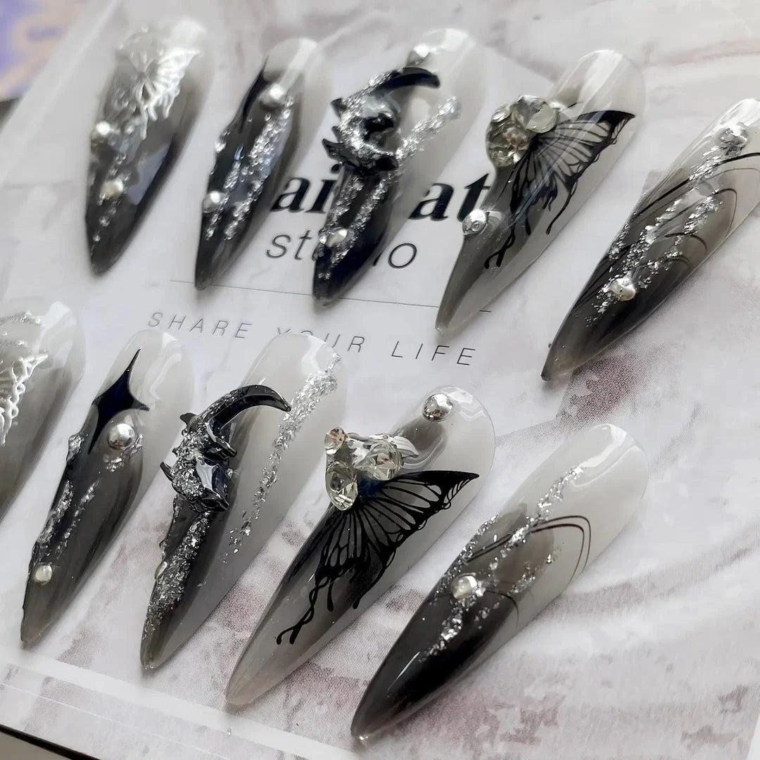 Meticulously crafted Gothic Dark Punk Butterfly Press-On Nails with intricate metal liquid butterfly designs