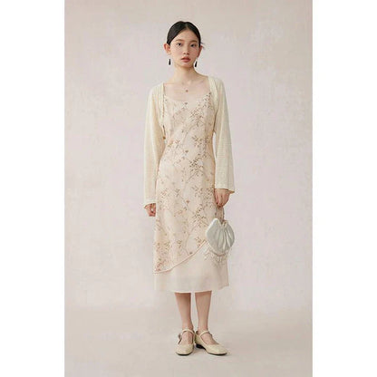 Elegant floral A-line midi dress with spaghetti straps and lace accents