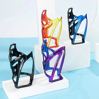 A stylish, lightweight cycling bottle holder with a two-tone design, securely holding a water bottle on a bike.