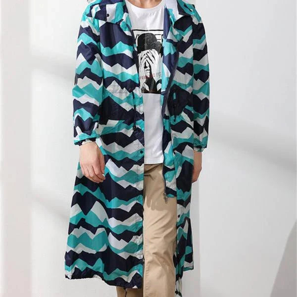 Men's long waterproof raincoat in light green color, made of high-quality Polyester Pongee fabric for durable, breathable, and weather-resistant performance.