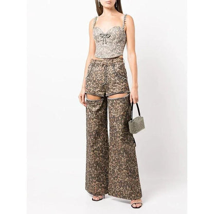 Chic high-waisted patchwork leopard print denim trousers with rivet details and wide-leg silhouette