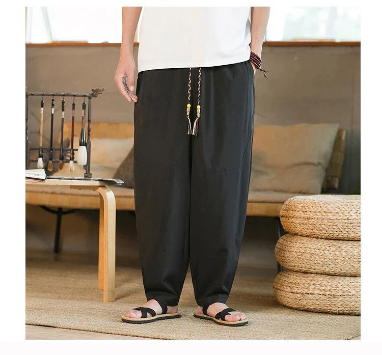 Men's Chinese-inspired harem pants made of luxurious ice silk fabric with a relaxed, draped silhouette