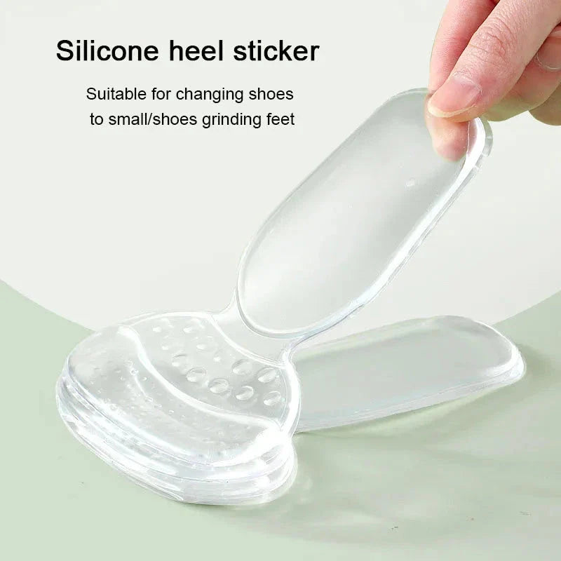 Transparent, flexible silicone heel protector stickers that provide cushioning and support for comfortable high heels, boots, and other footwear