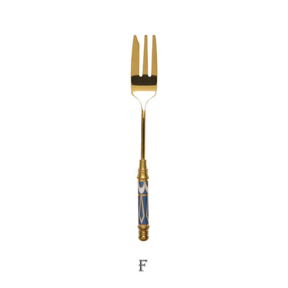 Elegant gold-plated dessert fork with intricate ceramic handle design