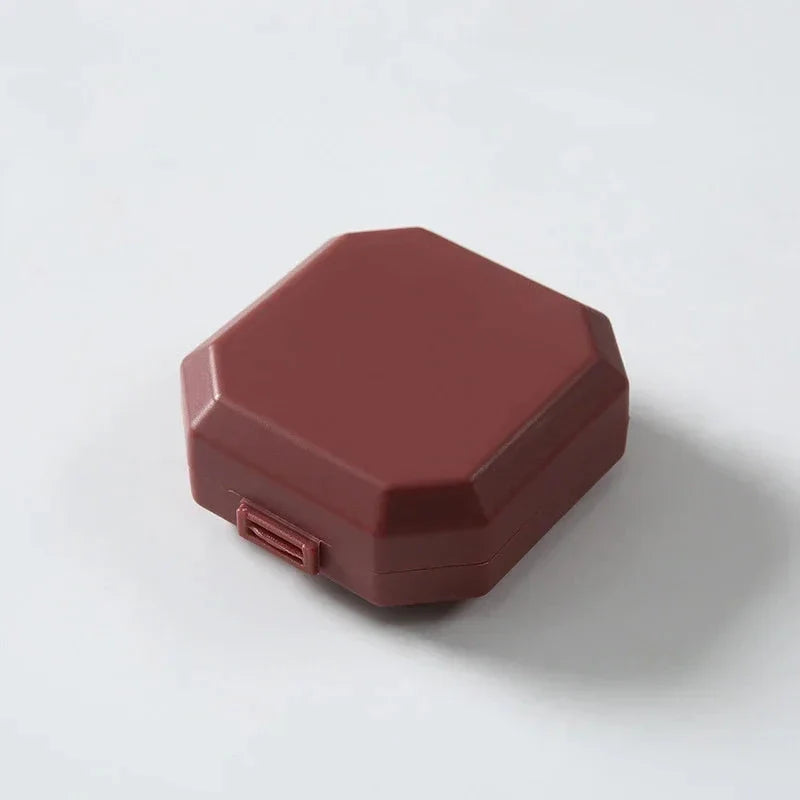 Compact Portable Pill Box with 6 Compartments for Organizing Medication on the Go