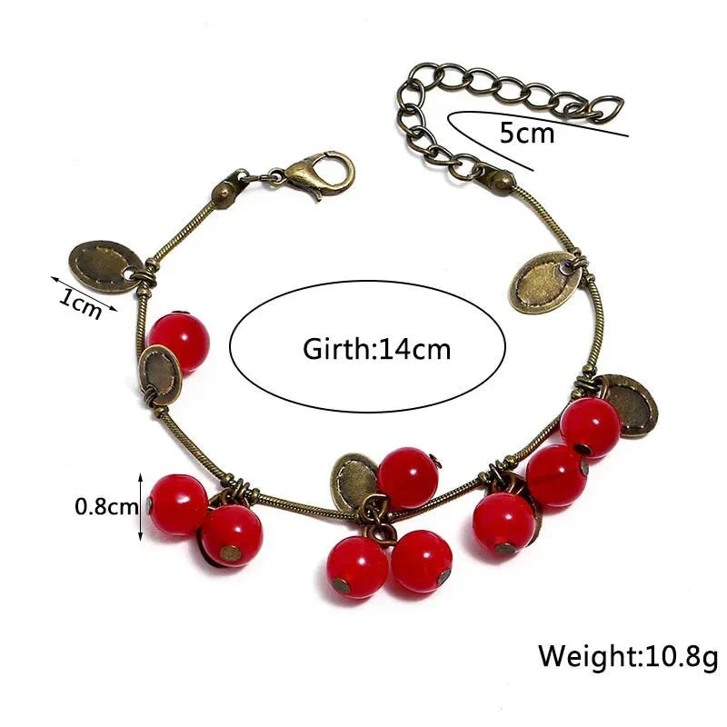 Boho vintage-inspired cherry coin bracelet with adjustable lobster-claw clasp, perfect for girls' summer fashion