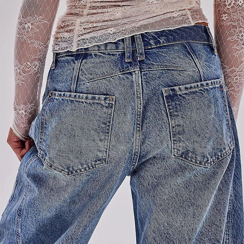 Trendha wide-leg summer pants in light blue, white, and black colors with a relaxed, stylish design