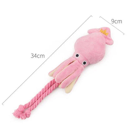 Plush pink squid-shaped dog toy made of soft, high-quality fleece material