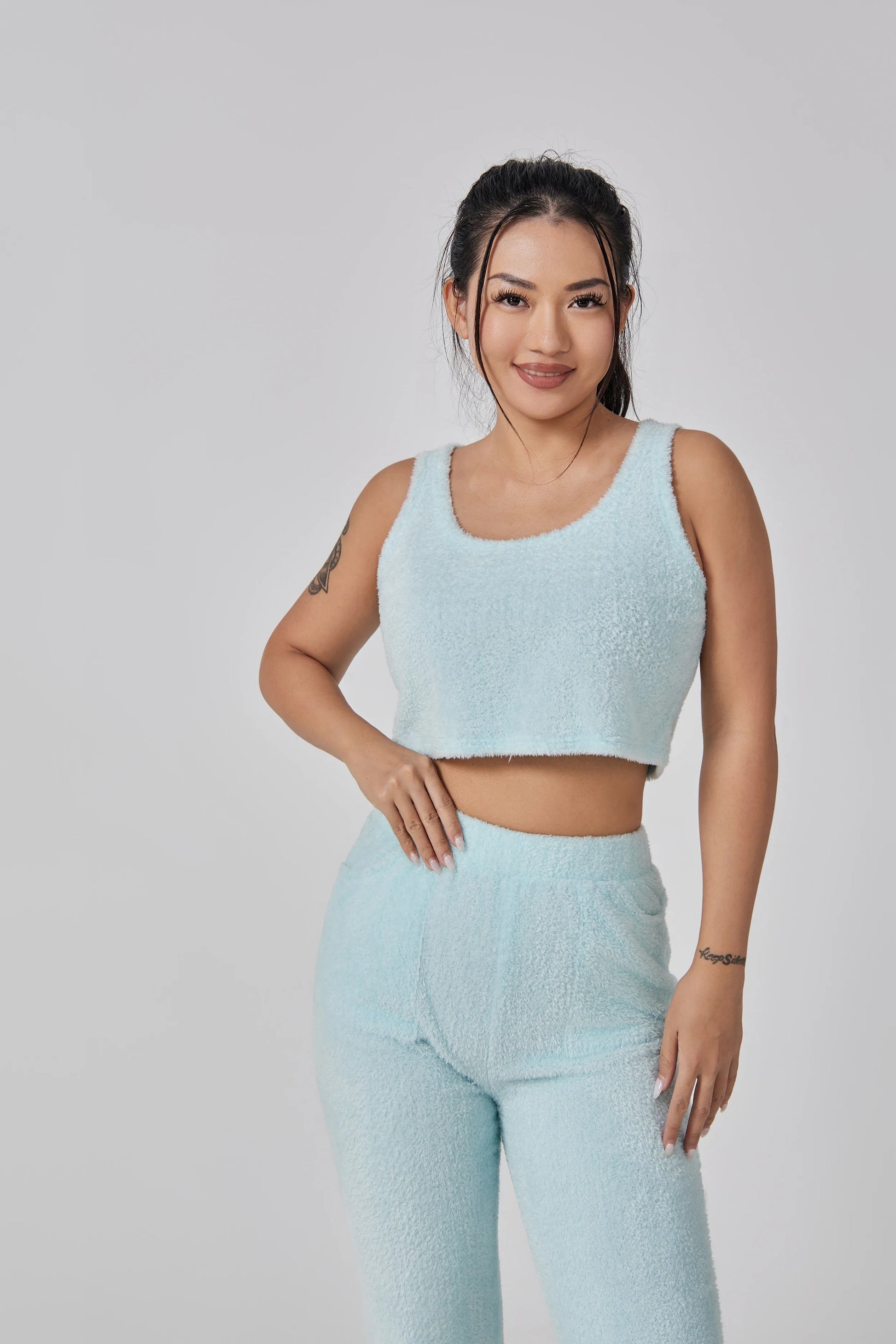 Cozy 3-piece loungewear set in pastel colors including crop top, wide-leg pants, and matching cardigan