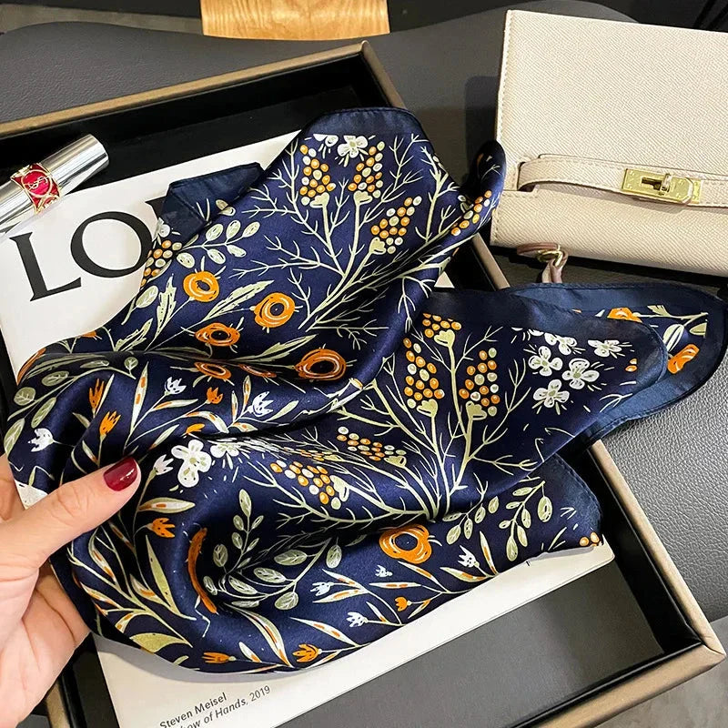 Floral print silk scarf in navy color, a versatile accessory for effortless style