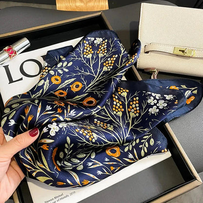 Floral print silk scarf in navy color, a versatile accessory for effortless style