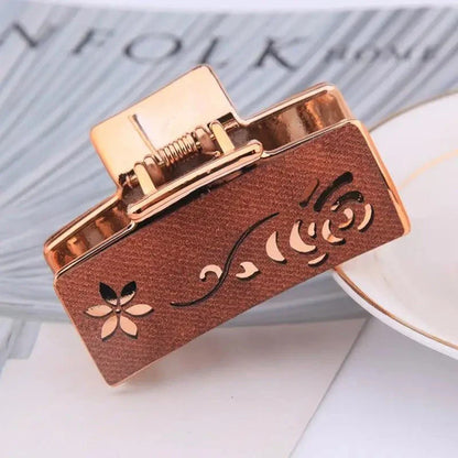 Elegant floral hair claw accessory for women, featuring a premium canvas and rubber design in a stylish brown color