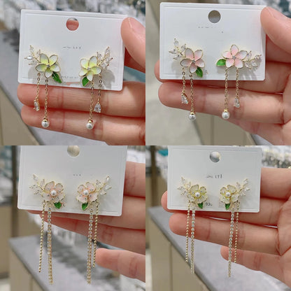 Elegant floral zircon and pearl tassel earrings in gold and silver tones