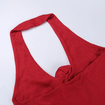 Chic knit halter vest with a captivating 3D floral pattern, delivering a trendy and versatile look for any occasion.