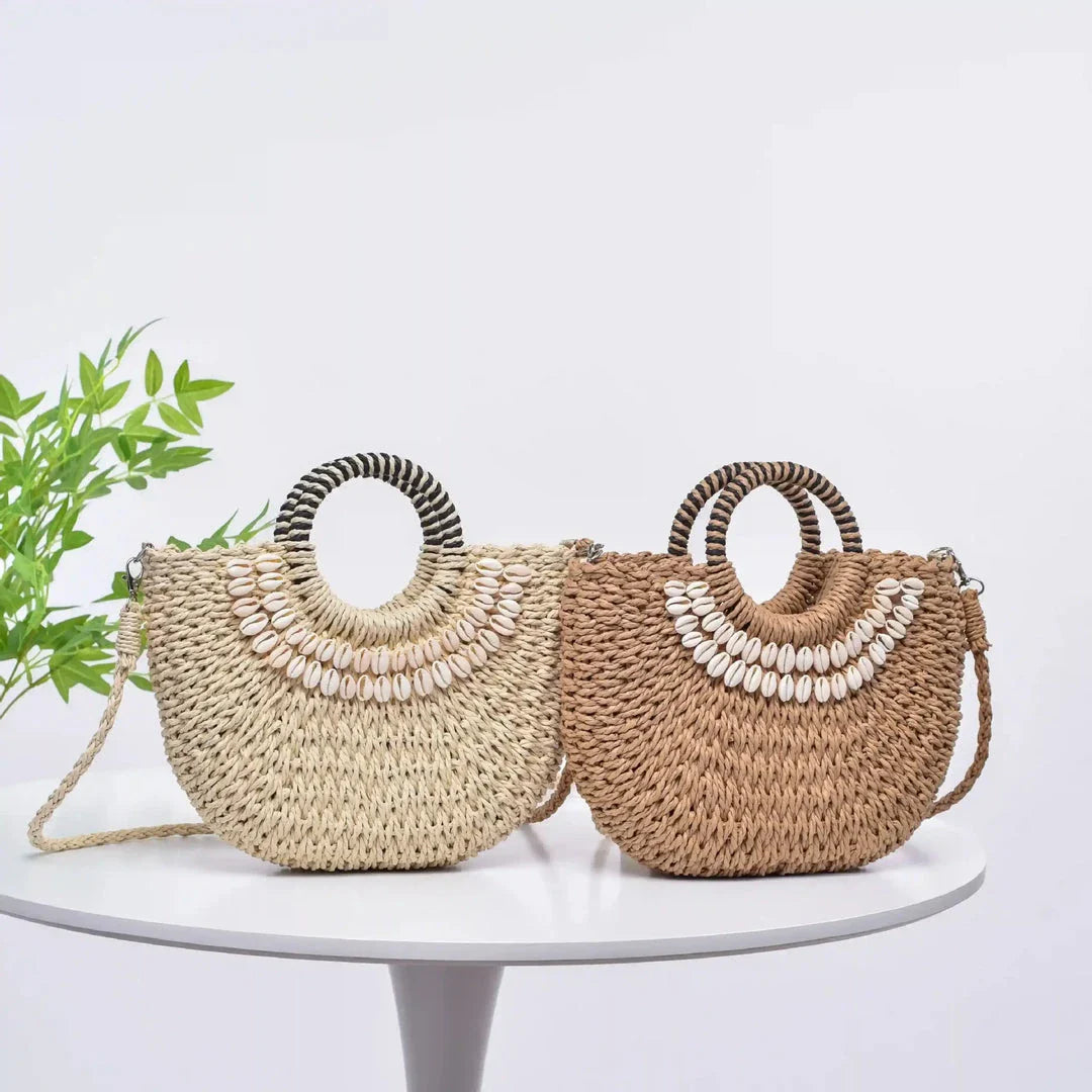 Handmade straw woven crossbody handbag with seashell accents, perfect for summer beach and resort wear