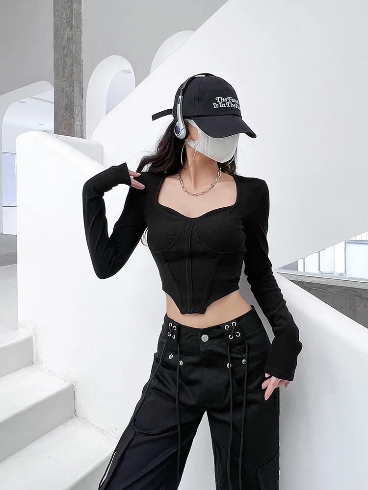 A stylish slim-fit short autumn top with an open waist design, made of premium polyester fabric with long sleeves and a square collar.