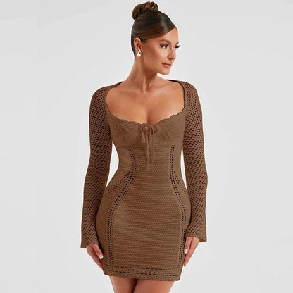 Strapless black knitted bodycon mini dress with chest wrapping and lace-up details