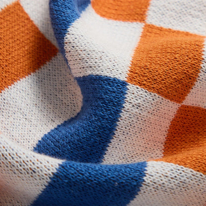 Cozy and stylish plaid blanket in blue, perfect for home decor, travel, and outdoor activities
