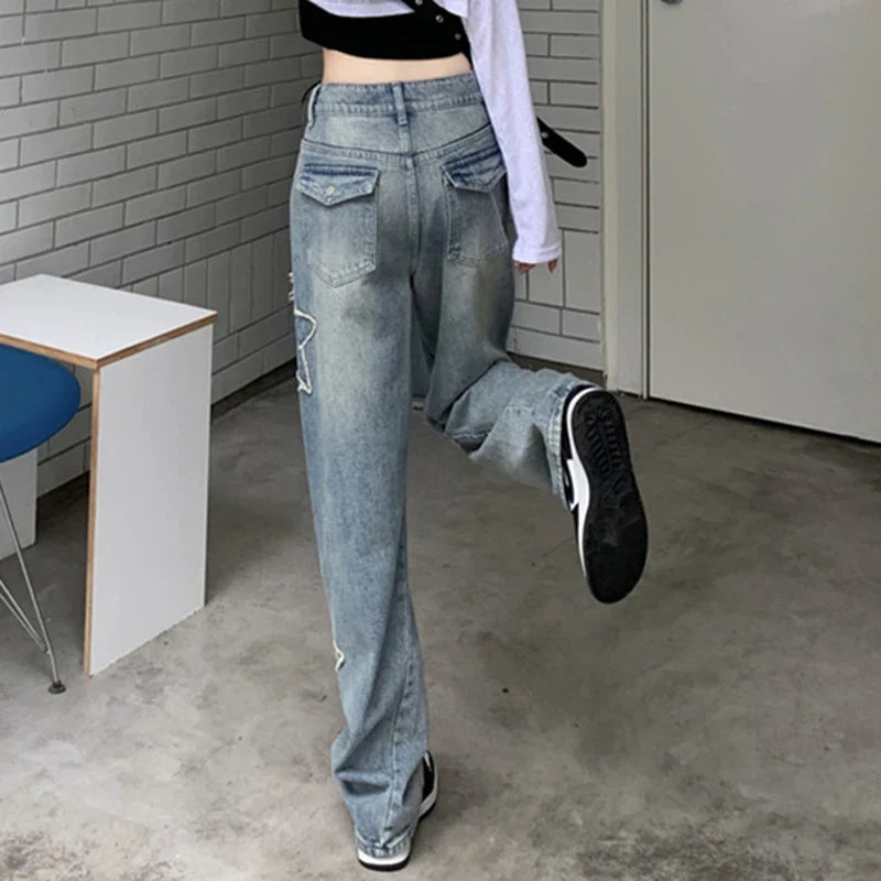 Premium embroidered high-rise straight leg denim jeans in a classic blue color