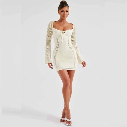 Elegant strapless knit bodycon mini dress in black with lace-up details