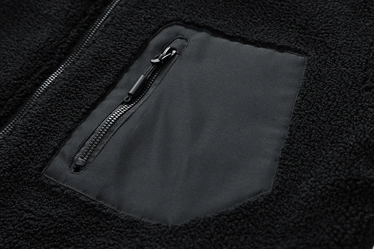 A cozy and stylish men's fleece jacket with a standing collar and convenient side pockets, available in a range of classic colors.