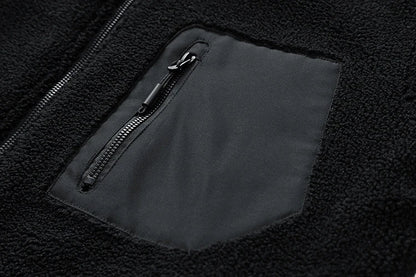 A cozy and stylish men's fleece jacket with a standing collar and convenient side pockets, available in a range of classic colors.