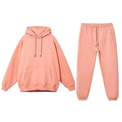 Cozy Fleece Hoodie and Sweatpants Set in Light Pink, featuring a relaxed fit and hooded design for maximum comfort and style.