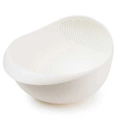 A multi-purpose kitchen drain basket with handles, made of high-quality polypropylene material for efficient draining and easy cleaning.