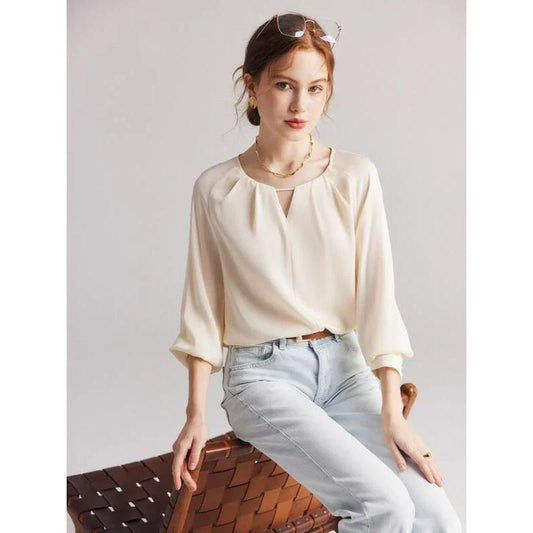 Elegant silk blend raglan sleeve blouse with timeless design and flattering fit for modern women