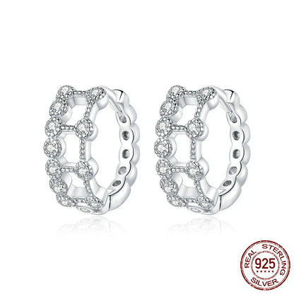Elegant double-layered electroplated silver earrings with a minimalist, sophisticated design