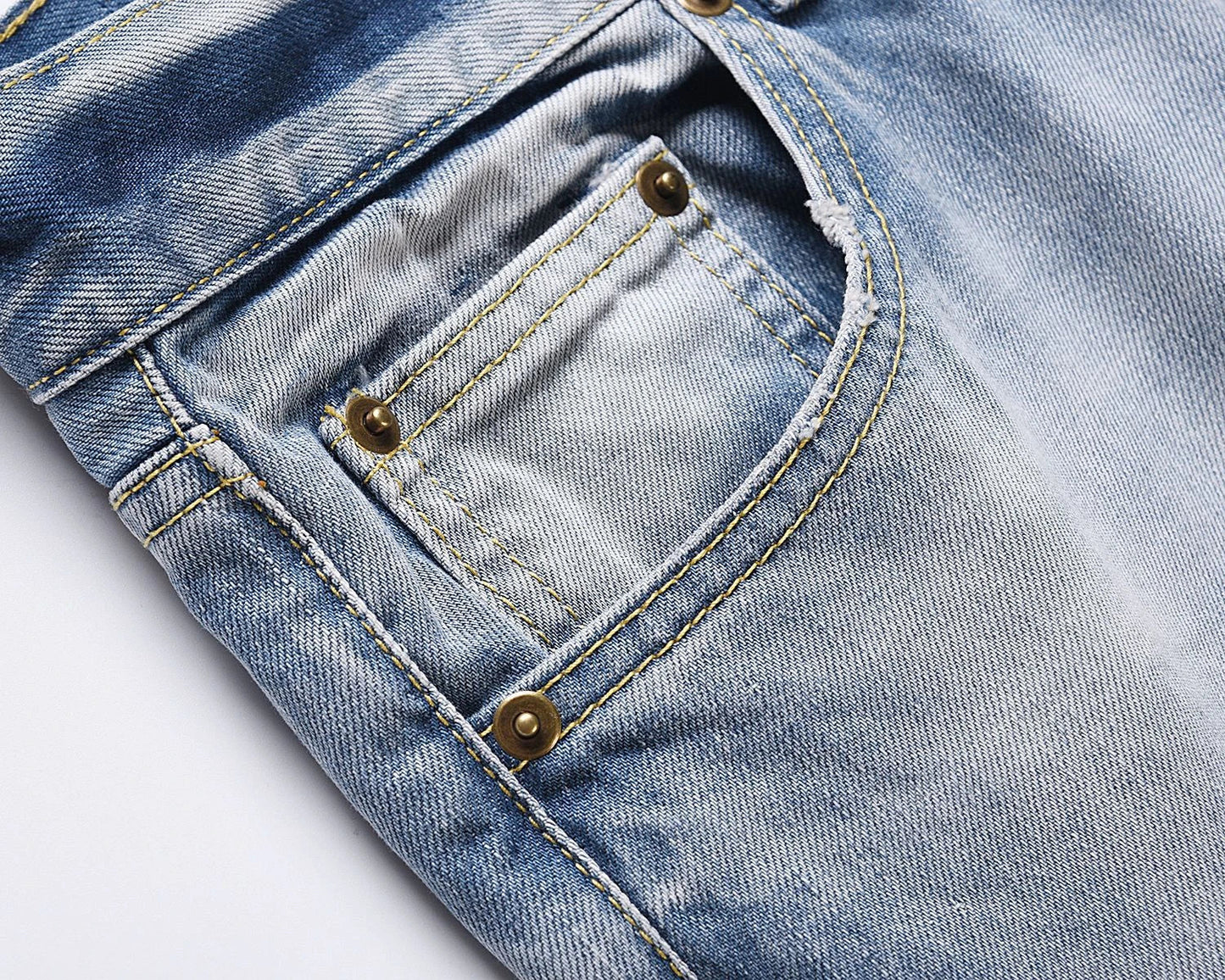 Premium distressed denim jeans with ripped detailing, perfect for casual streetwear style