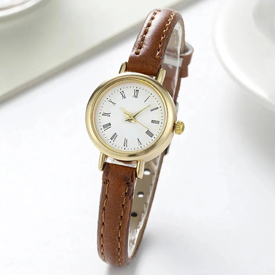 Elegant women's quartz leather wristwatch with a minimalist, timeless design