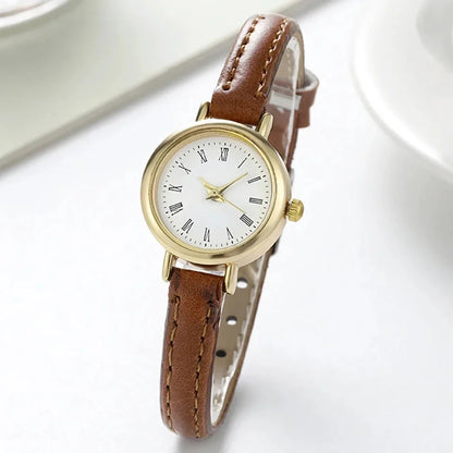 Elegant women's quartz leather wristwatch with a minimalist, timeless design