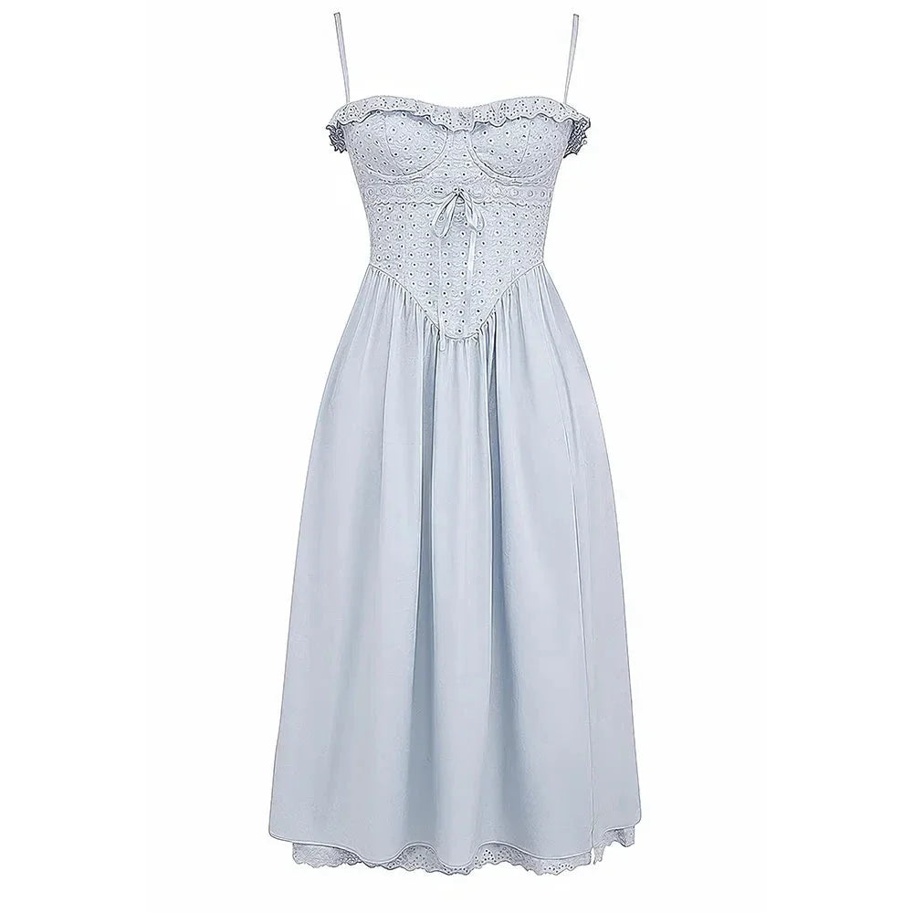 A stylish blue midi crochet dress with a floral pattern and spaghetti straps, perfect for summer occasions.