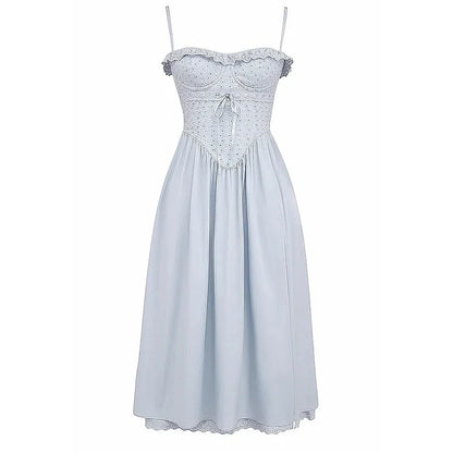 A stylish blue midi crochet dress with a floral pattern and spaghetti straps, perfect for summer occasions.