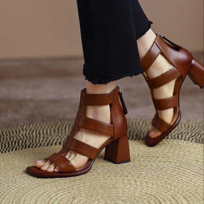 Premium leather gladiator sandals with square heel and adjustable buckle strap for stability and comfort