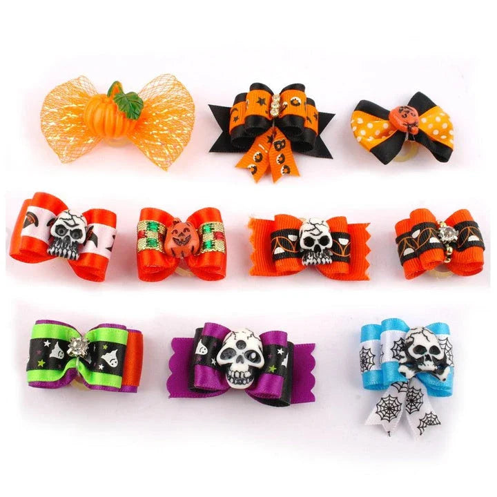 Colorful pet Halloween hair bows in a variety of spooky designs