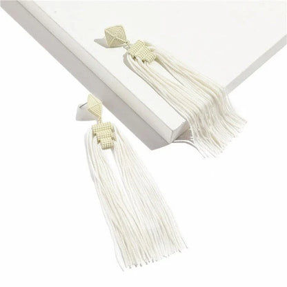 Elegant Bohemian Tassel Earrings with vintage-inspired charm and sophisticated metal finishes