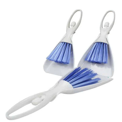 A versatile cage cleaning set with a brush and shovel for efficiently sweeping and scooping small pet bedding and waste