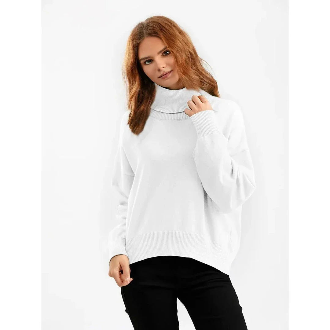Chic and cozy oversized turtleneck sweater for women in a solid color, perfect for cold weather fashion and style