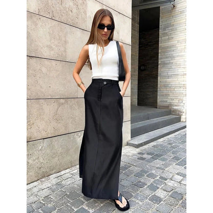 Elegant black ankle-length a-line skirt with pockets, made from a premium blend of polyester, spandex, and viscose for a comfortable, non-stretch fit.