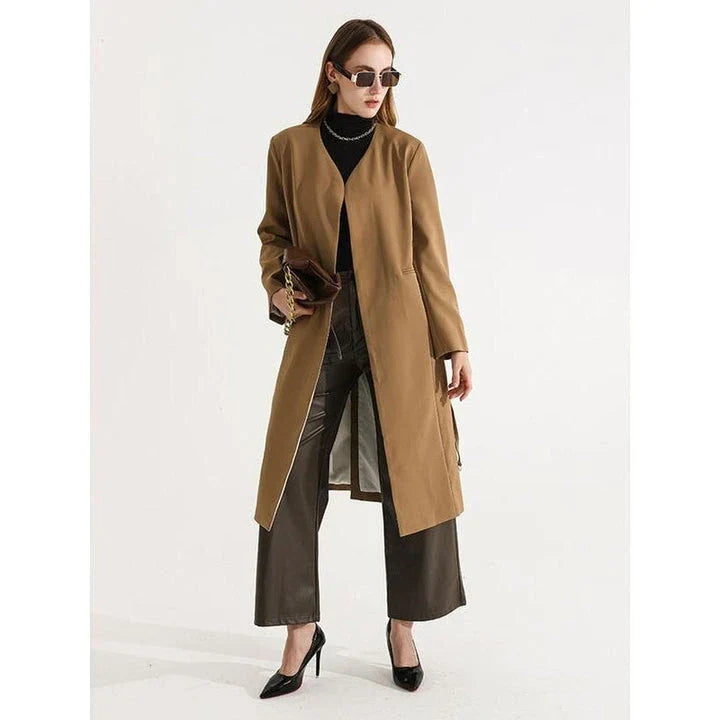 Women's full-length trench coat with lace-up waist, turn-down collar, and elegant full sleeves