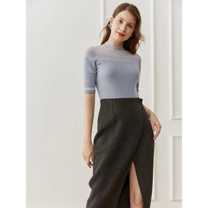 Elegant and comfortable women's half sleeve knitted top in black color with a stylish and sophisticated design