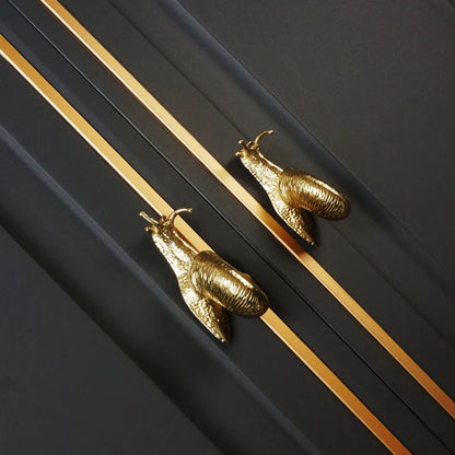 Elegant European-style retro brass snail cabinet door handles in small and large sizes for wardrobe, cabinet, and drawer upgrades