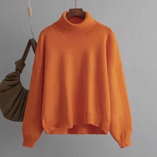 Chic and cozy oversized turtleneck sweater for women in a solid color, perfect for cold weather fashion and style