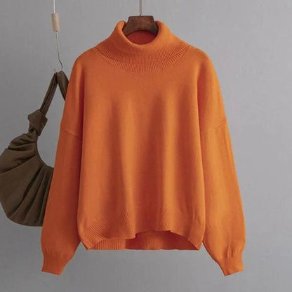 Chic and cozy oversized turtleneck sweater for women in a solid color, perfect for cold weather fashion and style