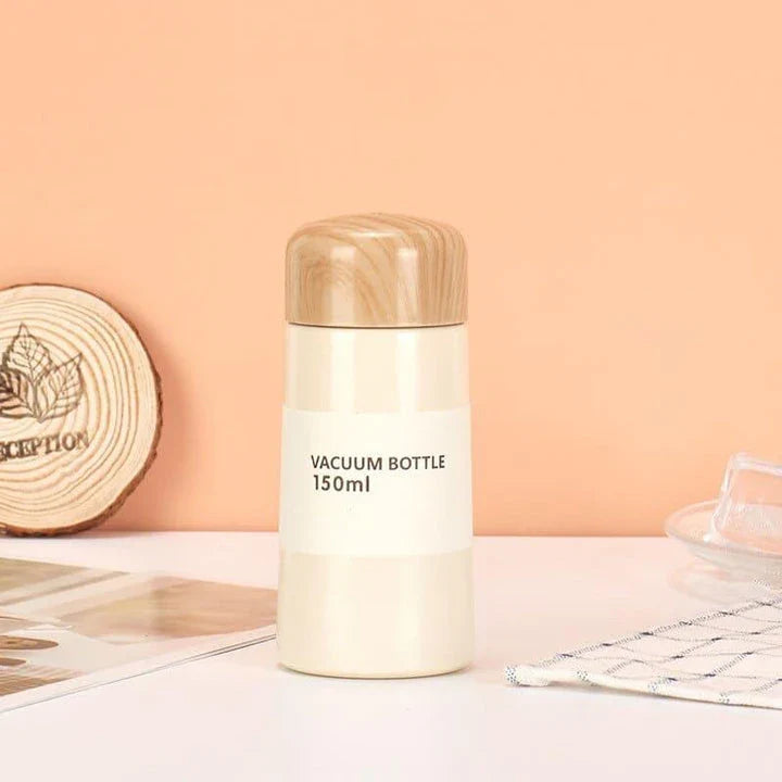 Stylish floral double-wall stainless steel water bottle with a convenient straw lid, maintaining temperature for up to 12 hours.
