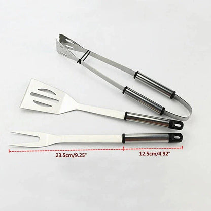 Stainless steel BBQ tool set with fork, tongs, and shovel for outdoor grilling and cooking
