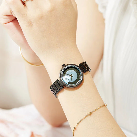 A fashionable stainless steel women's watch with diamond accents, waterproof design, and a modern quartz movement.