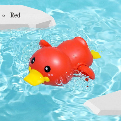 A set of colorful clockwork bathing ducks swimming in the water, providing fun and engaging bath time entertainment for children aged 0-6 years.